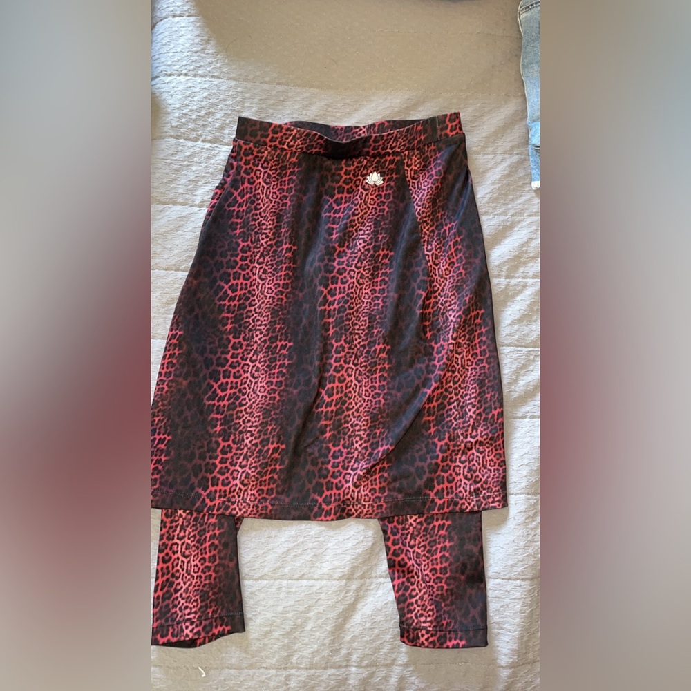 Size small snoga skirt. Leggings underneath are about knee length. Barely worn.
